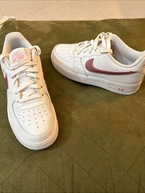 Nike Air Force White Sneakers with Pink Swoosh